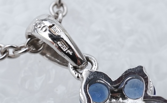 A sapphire and diamond pendant
